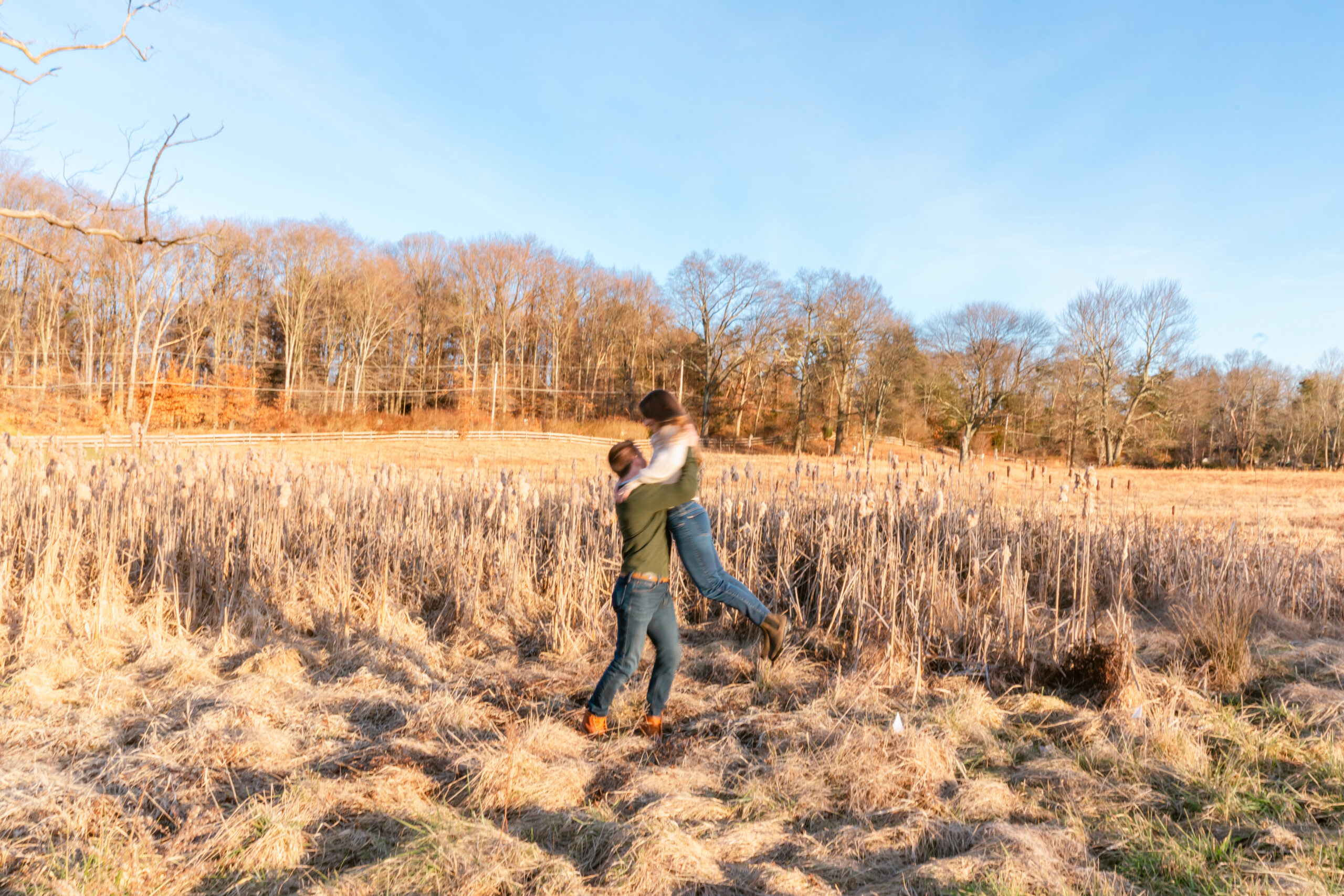 Couple dancing in a field of phragmites 