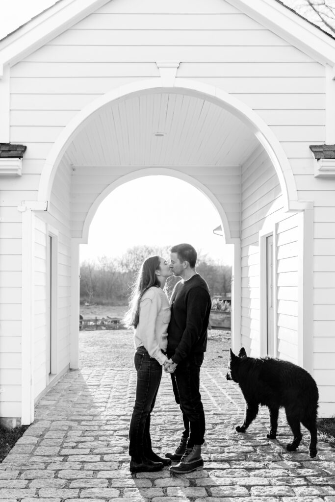 Kissing under an archway