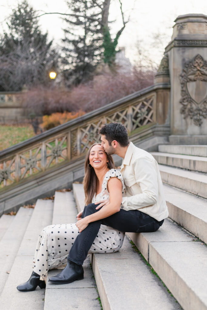 Couple sitting and posing on Bethesda stairs