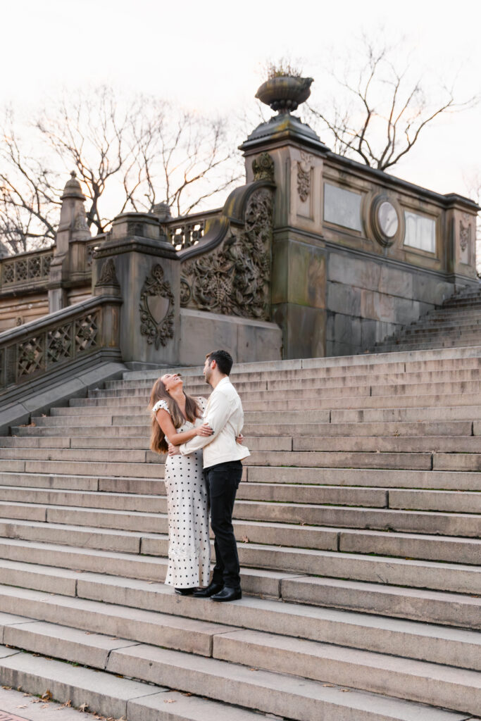 Couple laughing on Bethesda stairs