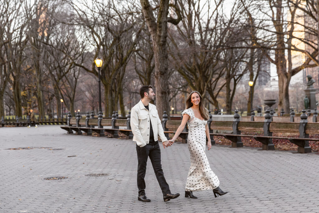 Couple walking and posing in central park