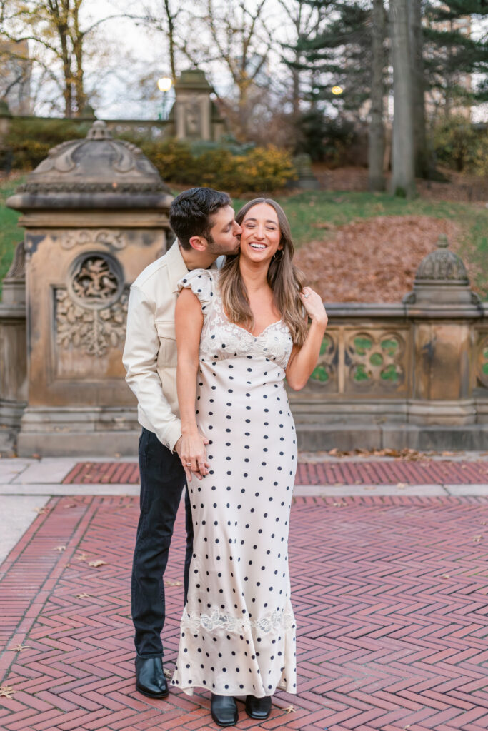 Couple walking and posing in central park