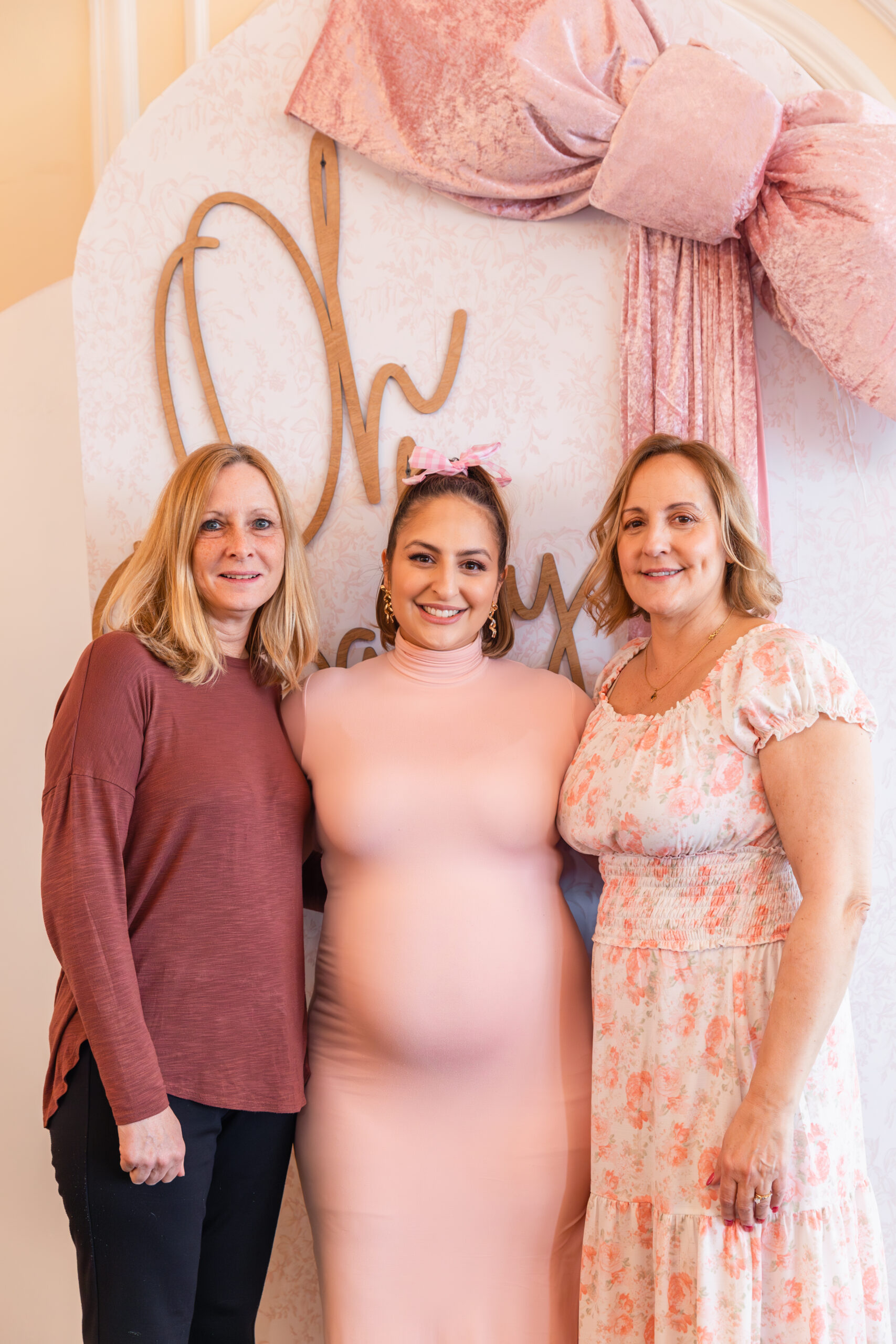 Baby Shower Guest Outfits and photo wall