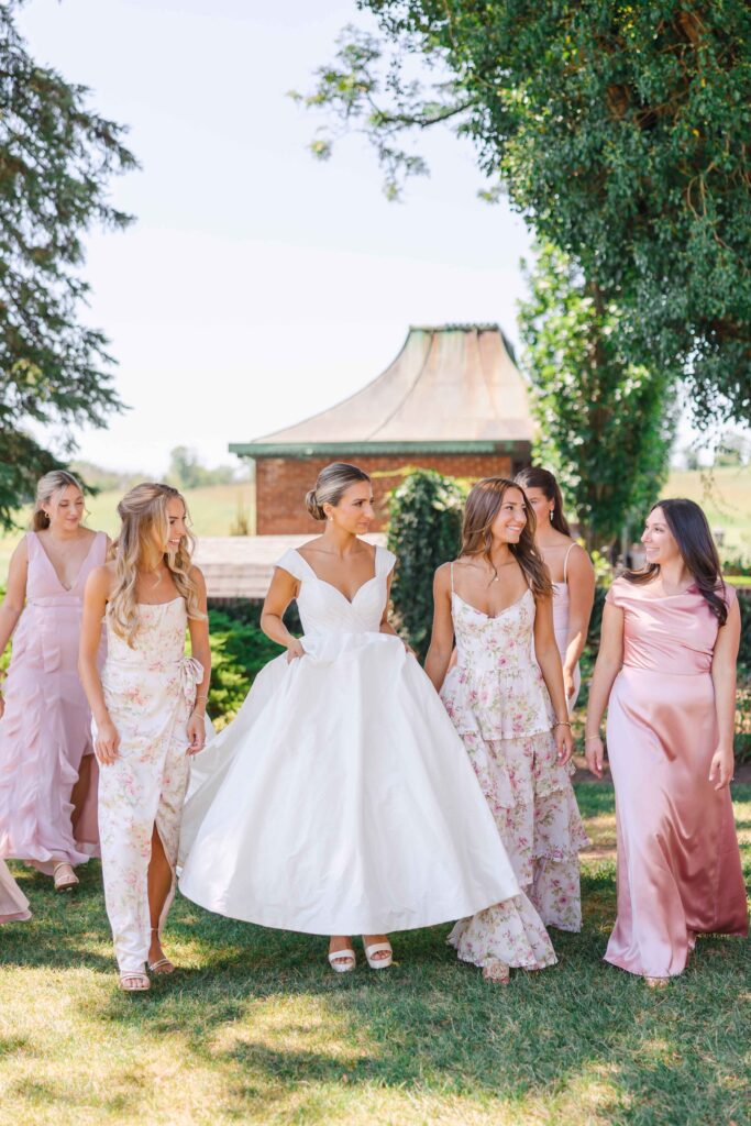 bridesmaids in floor length pink dresses