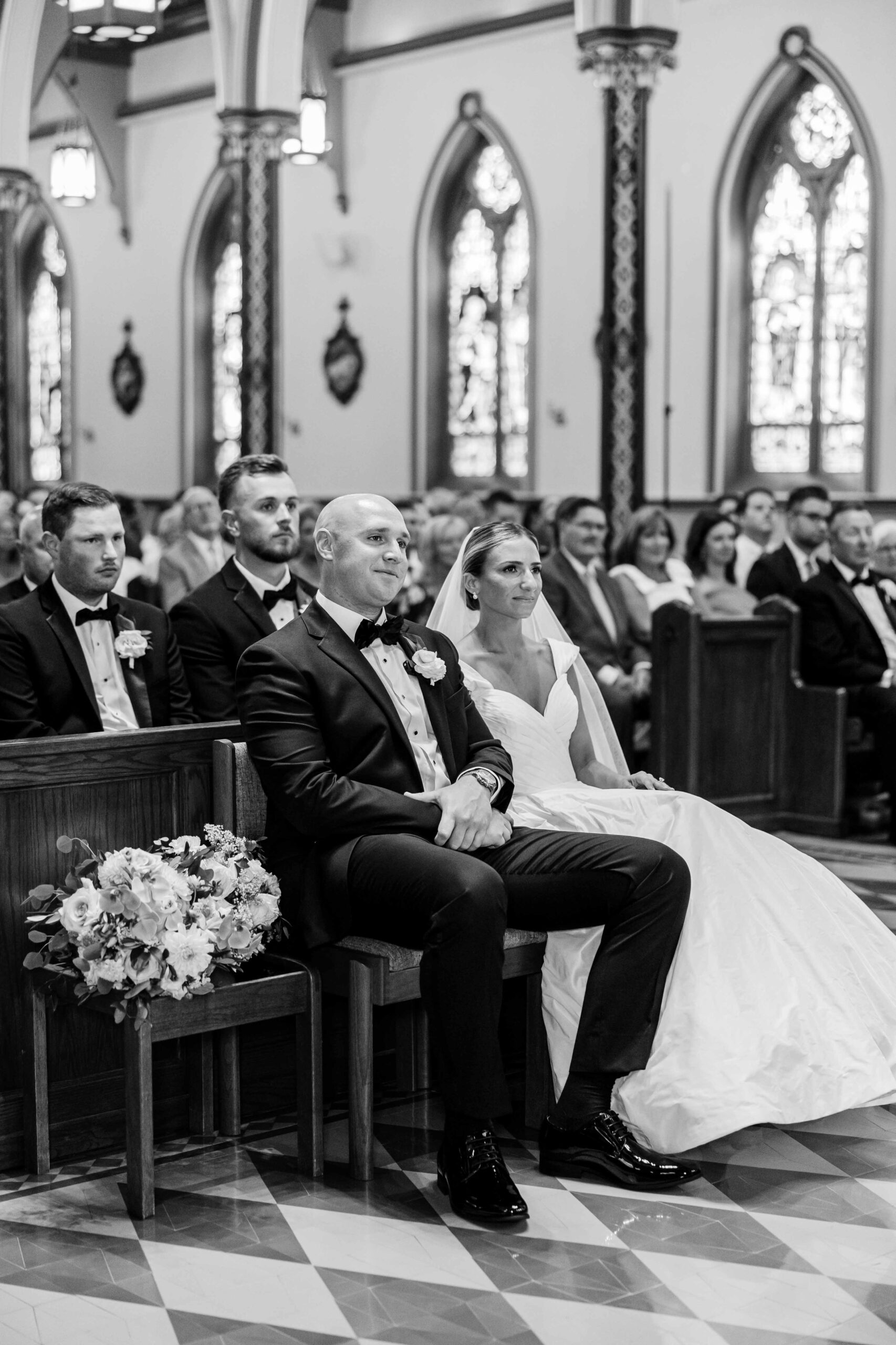 black and white image at church on wedding day