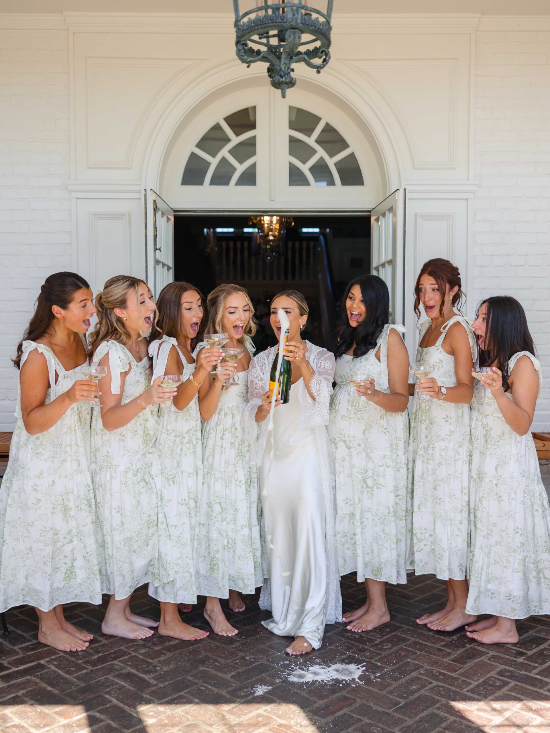 bridesmaids getting ready dresses champagne pop