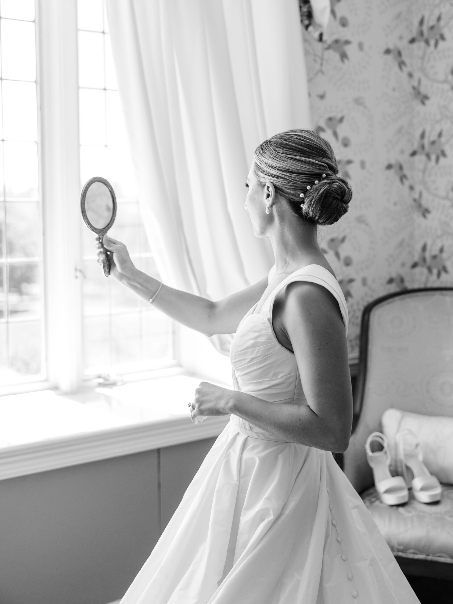 looking in the mirror the morning of your wedding